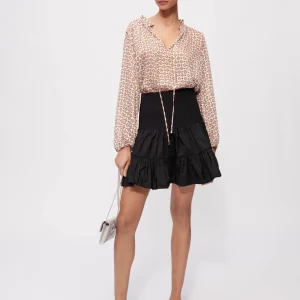 Falda corta con frunces y volantes