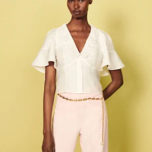 Camisa corta con capa avolantada