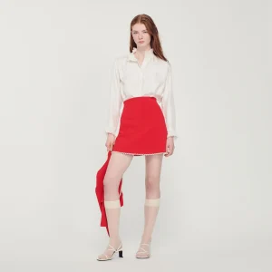 Falda corta con perlas