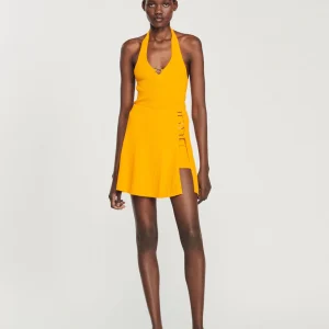 Falda corta de punto con detalle joya