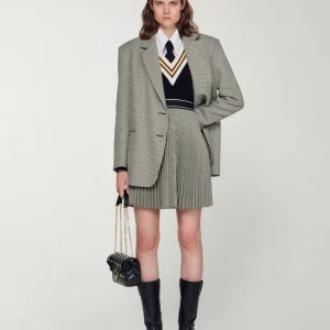 Falda corta plisada con estrás