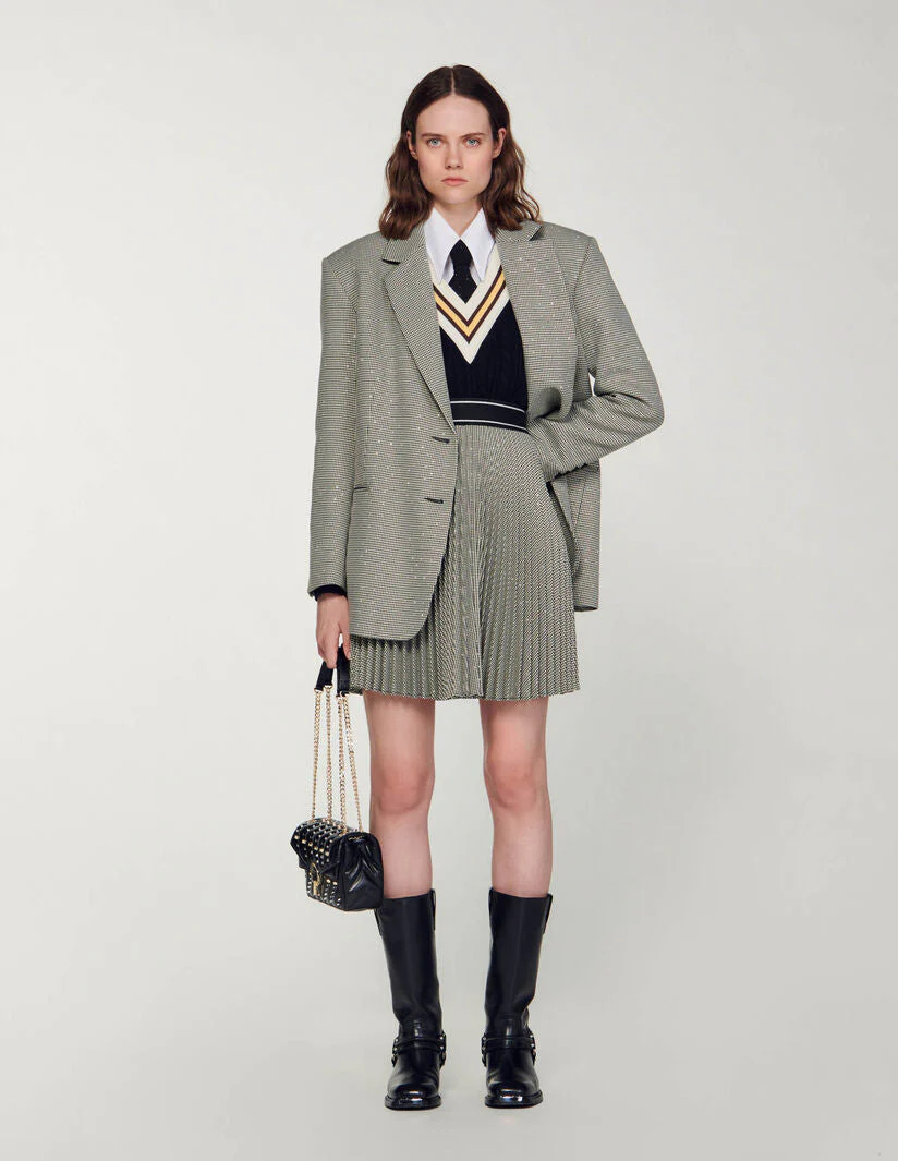 Falda corta plisada con estrás