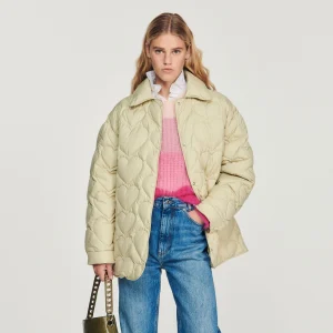 Plumífero oversize de corazones