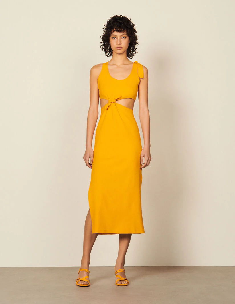 Vestido midi detalles calados laterales