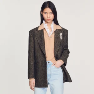 Chaqueta de sastre con broche joya