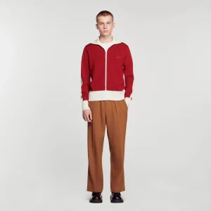 Cárdigan de dos tonos con cuello alto y cremallera