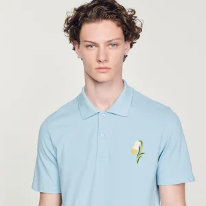 Polo de manga corta, bordado de lirios